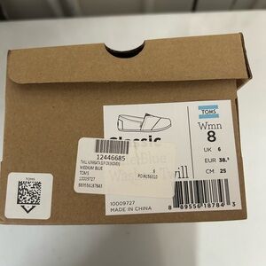 Toms Classic Slip-On Shoes in Light Blue Canvas